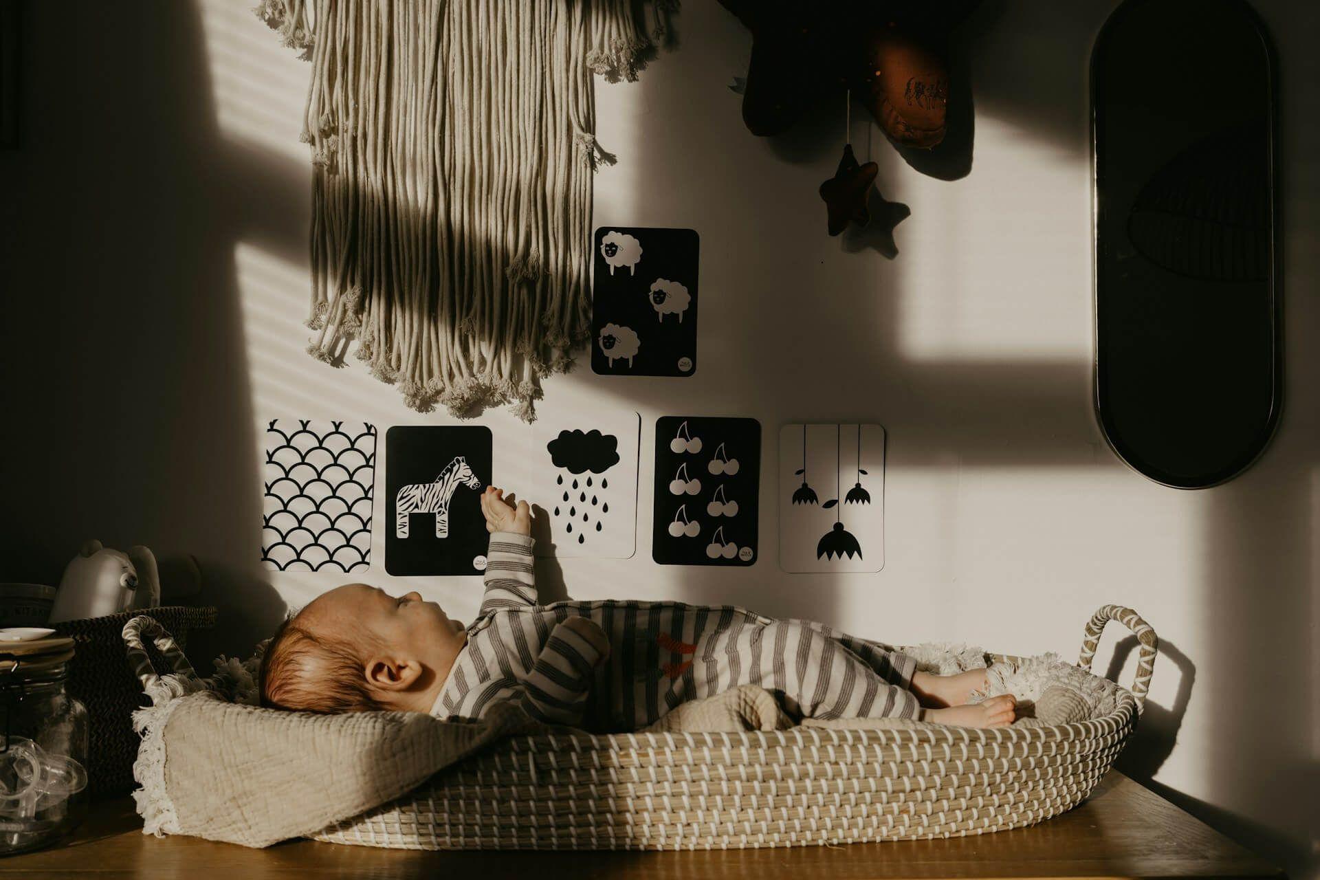 Photo - A baby laughing in sleep symbolizing innocence and spiritual purity