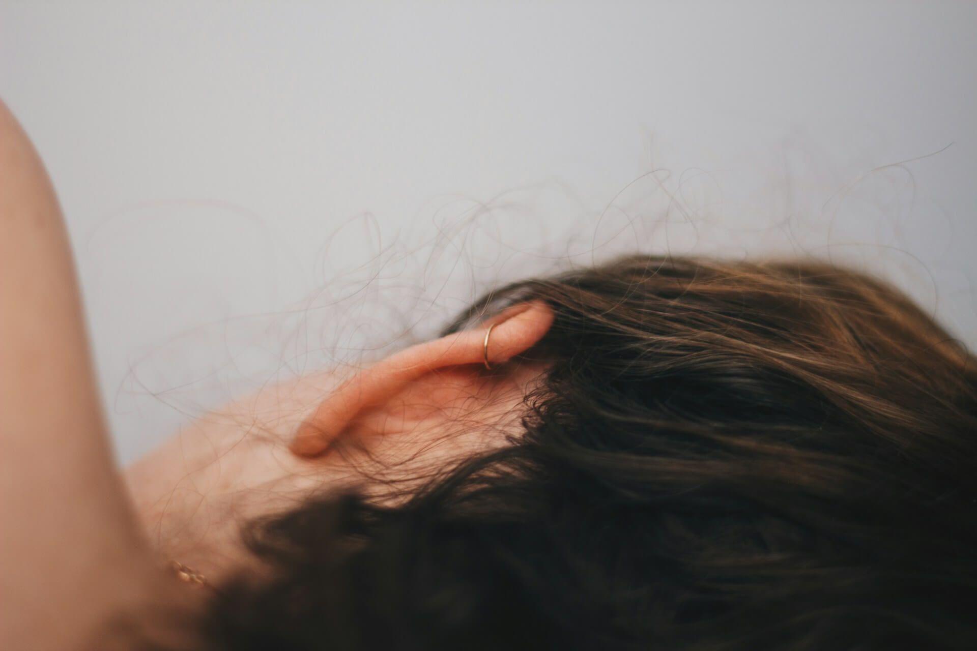 A picture of left ear pain symbolizing spiritual messages and inner awareness Photo - A picture of left ear pain symbolizing spiritual messages and inner awareness