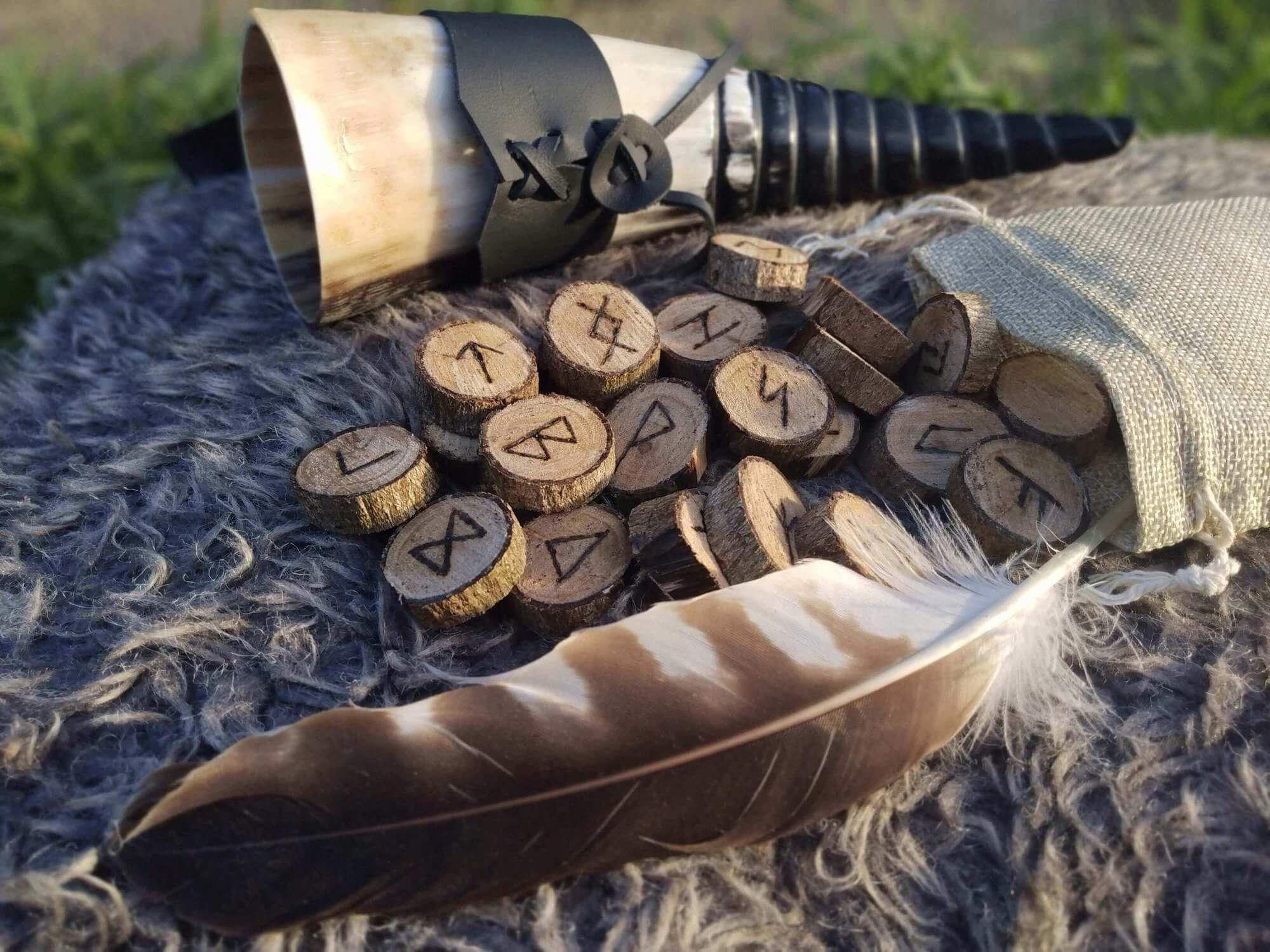 A set of rune stones with engraved symbols Photo - A set of rune stones with engraved symbols